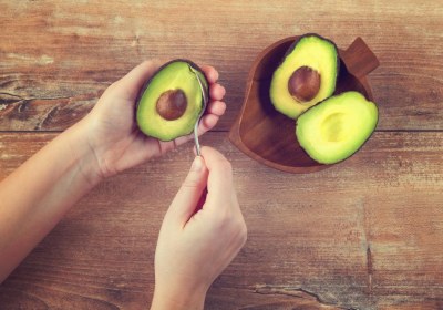 cut-avocados-being-eaten-with-a-spoon